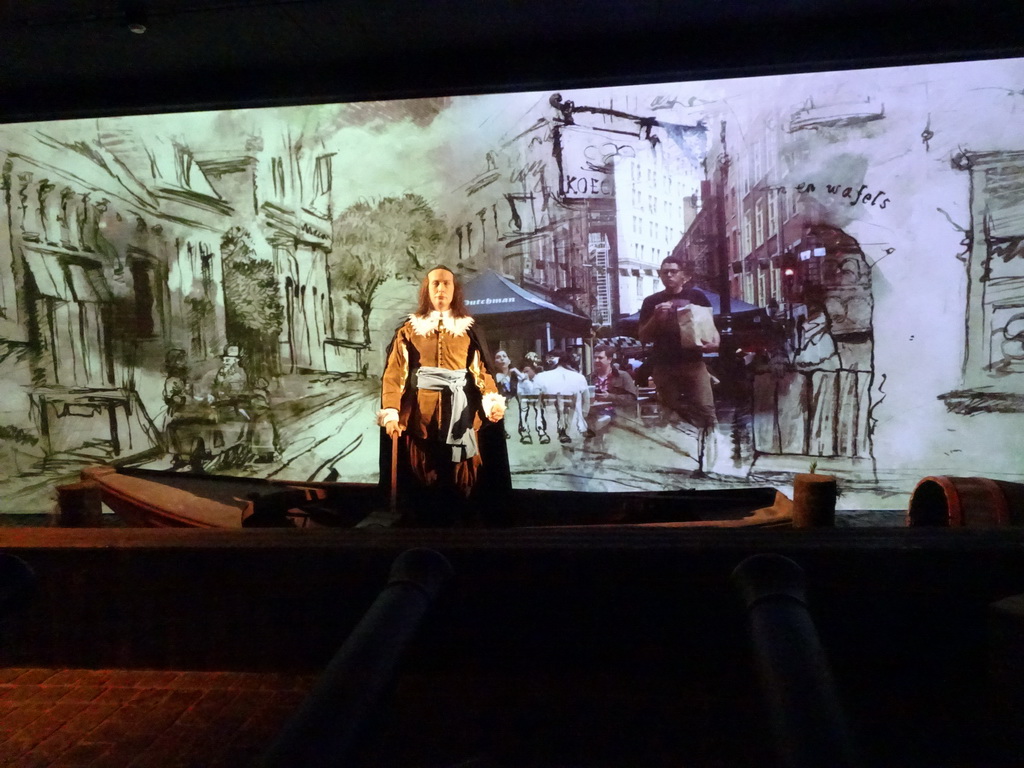 Wax statue of Peter Stuyvesant and a big screen in the `Nieuw Amsterdam` attraction at the Madurodam miniature park