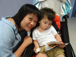 Miaomiao and Max with a stroopwafel in the `Zo Groot Is Oranje` attraction at the Madurodam miniature park