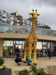 Giraffe statue in front of the Legoland Discovery Centre at the Strandweg road