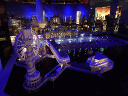 Scale models of the Pier of Scheveningen, the Kurhaus building and other buildings at the The Hague Miniland at the Legoland Discovery Centre, by night