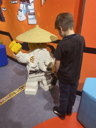 Max with a Ninjago statue at the Legoland Discovery Centre