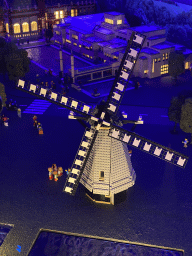Scale model of a windmill and other buildings at the The Hague Miniland at the Legoland Discovery Centre, by night
