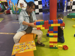 Miaomiao and Max playing with large Lego blocks at the Building Area at the Legoland Discovery Centre