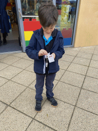 Max with a toy in front of the shop at the Legoland Discovery Centre at the Strandweg road