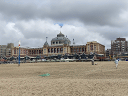 Miaomiao at the Scheveningen Beach, with a view on the Kurhaus building