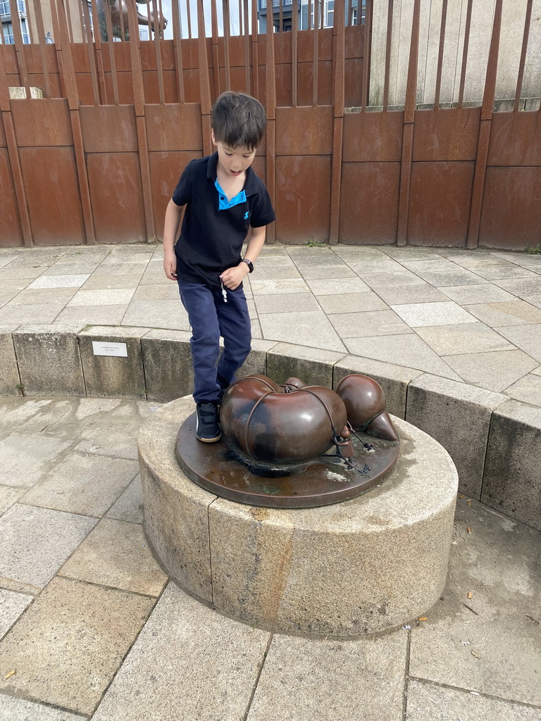 Max with a Fairytale Statue at the Strandweg street