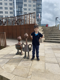 Max with a Fairytale Statue at the Strandweg street