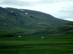 Farms and mountains, viewed from the rental car on the Þingvallavegur road