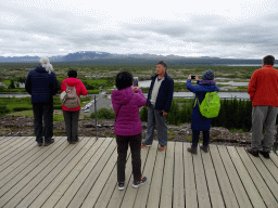 Miaomiao`s parents at the Hakið Viewing Point, with a view on the Þingvellir National Park and the north side of Þingvallavatn lake
