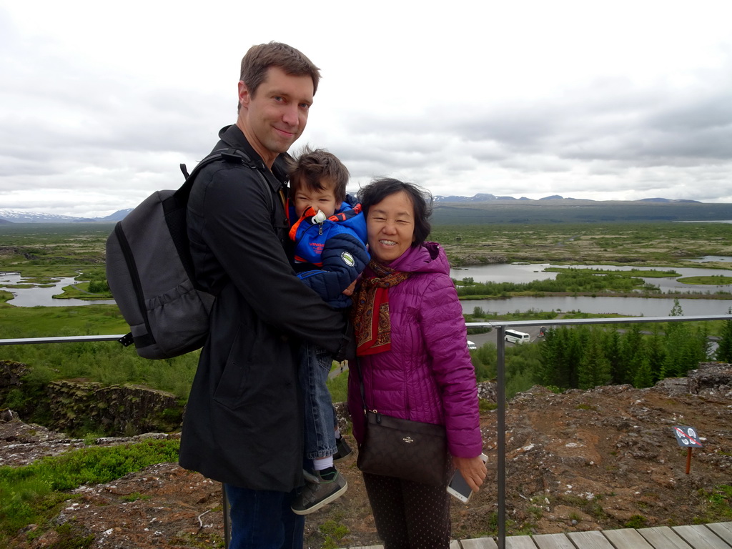 Tim, Max and Miaomiao`s mother at the Hakið Viewing Point, with a view on the Þingvellir National Park and the north side of Þingvallavatn lake