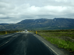 The Þingvallavegur road and mountains, viewed from the rental car
