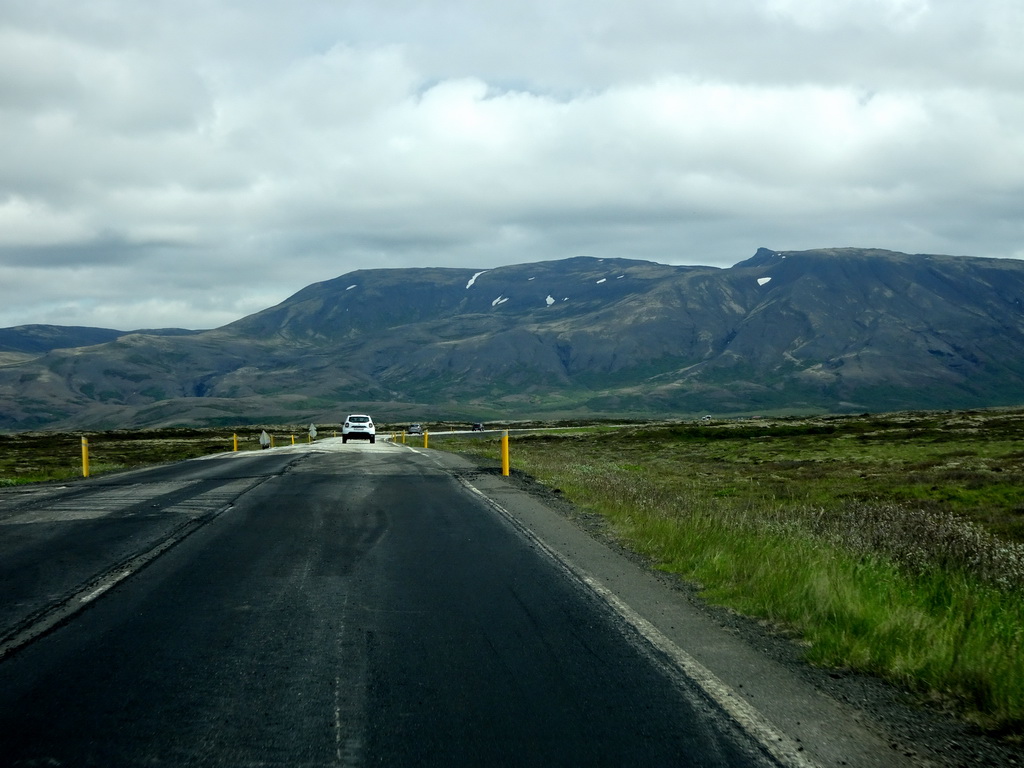 The Þingvallavegur road and mountains, viewed from the rental car