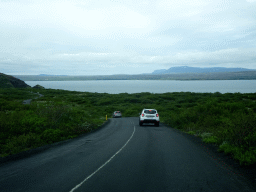 The Þingvallavegur road, the east side of the Þingvallavatn lake and mountains, viewed from the rental car