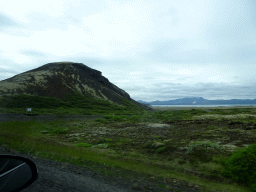 Mountain and the east side of the Þingvallavatn lake, viewed from the rental car on the Þingvallavegur road