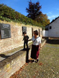 Miaomiao and Max at the wall south of the Sint-Michaëlskerk church