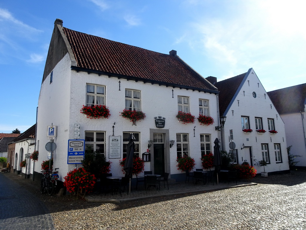 Front of the Drie Cronen Restaurant at the Hofstraat street