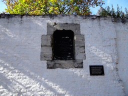 Part of the facade of the former palace of Thorn at the Hofstraat street, with explanation