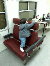 Max in the train compartment at the second floor of the Natuurmuseum Brabant