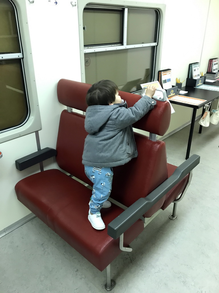 Max in the train compartment at the second floor of the Natuurmuseum Brabant