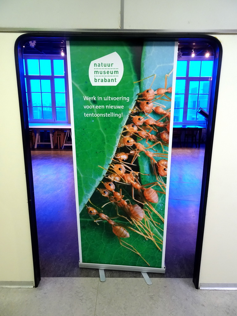 Poster in front of an exhibition under construction at the second floor of the Natuurmuseum Brabant