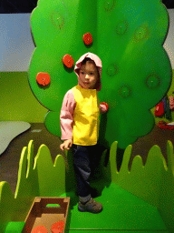 Max at the apple tree at the `Kikker is hier!` exhibition at the second floor of the Natuurmuseum Brabant