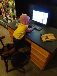 Max at a desk at the `Jouw Brabant, mijn Brabant - een landschap vol herinneringen` exhibition at the first floor of the Natuurmuseum Brabant