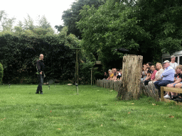 Zookeeper with a Vulture at the Dierenpark De Oliemeulen zoo, during the Birds of Prey Show