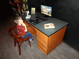 Max at a desk at the `Jouw Brabant, mijn Brabant - een landschap vol herinneringen` exhibition at the first floor of the Natuurmuseum Brabant