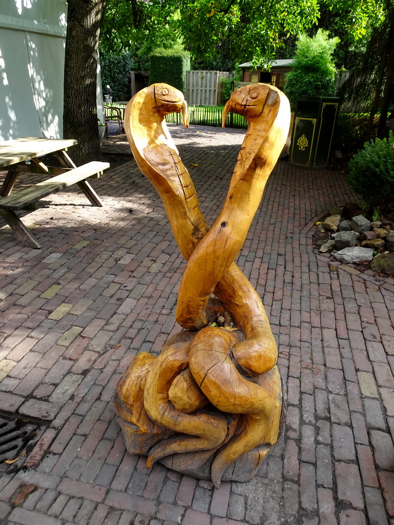 Statue of two snakes at the Dierenpark De Oliemeulen zoo