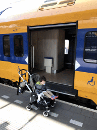 Max in front of the train at the Den Bosch Railway Station