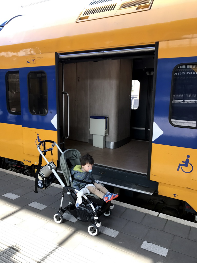 Max in front of the train at the Den Bosch Railway Station