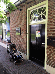 Max in front of the Dierenpark De Oliemeulen zoo at the Reitse Hoevenstraat street