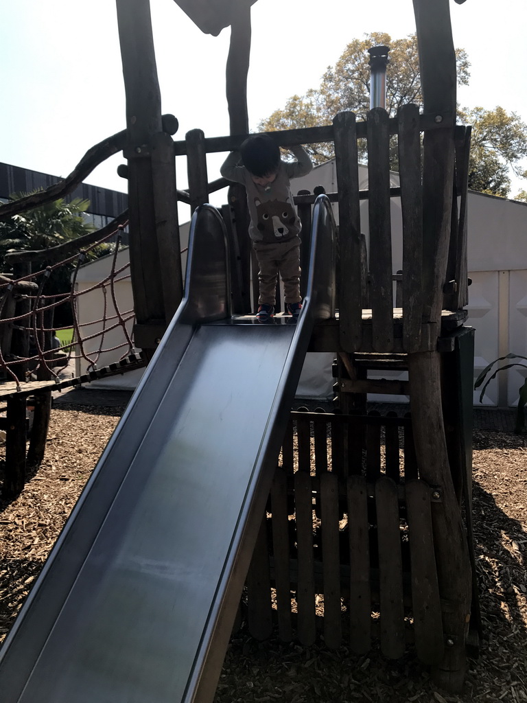 Max at the slide at the playground at the Dierenpark De Oliemeulen zoo