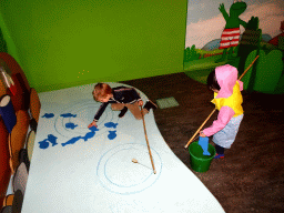 Max at the fishing game at the `Kikker is hier!` exhibition at the second floor of the Natuurmuseum Brabant