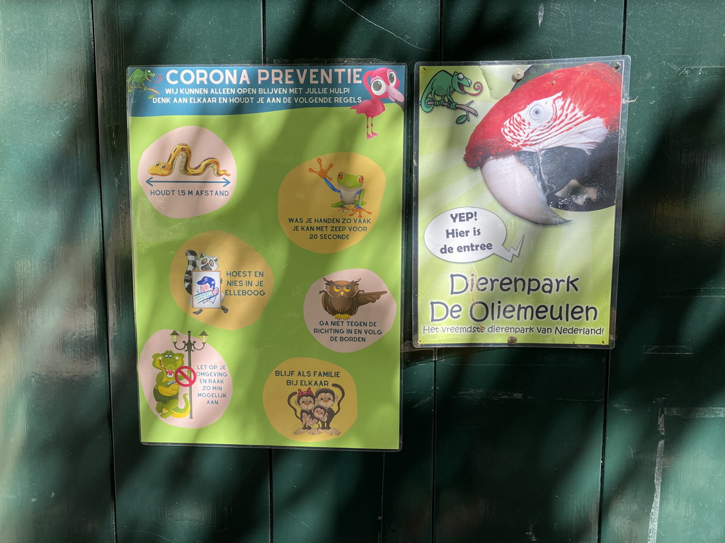 Sign about the COVID-19 rules at the entrance to the Dierenpark De Oliemeulen zoo at the Reitse Hoevenstraat street