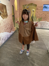 Max with dinosaur clothes at the `Vreemde vogels, die dino`s` exhibition at the second floor of the Natuurmuseum Brabant