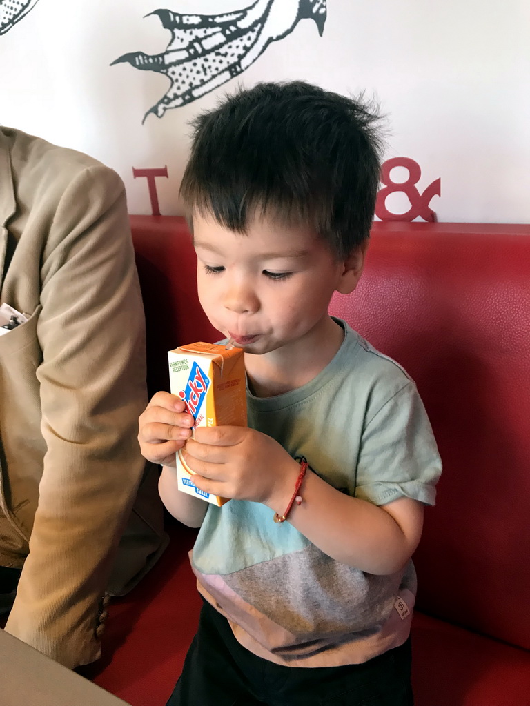 Max drinking in the Museumcafé at the ground floor of the Natuurmuseum Brabant