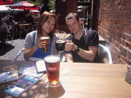 Miaomiao and Wilco having beer at the Mill Street Brewery, in the Distillery District