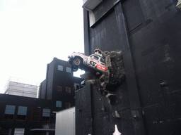 Car coming out of a building