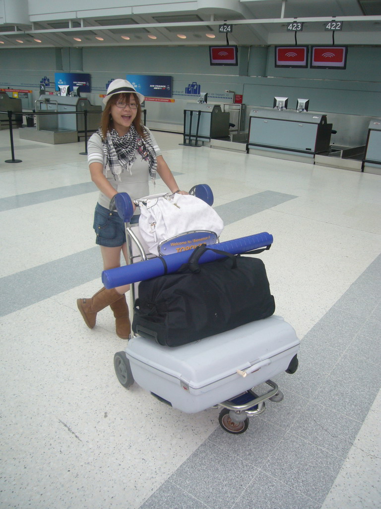 Miaomiao with our suitcases at the Toronto Pearson International Airport