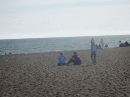 Children with SSC Napoli shirts at the RenaNera Beach