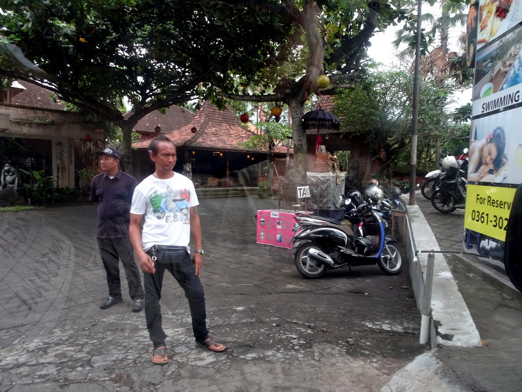 Taxi stop at the Jalan Raya Pengosekan Ubud street, viewed from the taxi