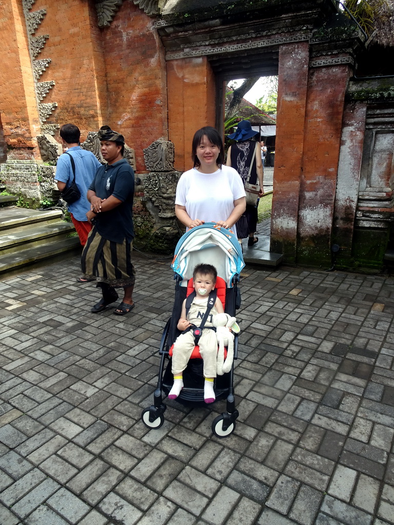 Miaomiao and Max in front of a gate at the Puri Saren Agung palace