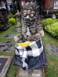 Statue in front of the Ubud Tourist Information Centre at the crossing of the Jalan Monkey Forest street and the Jalan Raya Ubud street