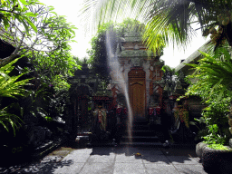Entrance gate to a small temple at the Jalan Raya Ubud street
