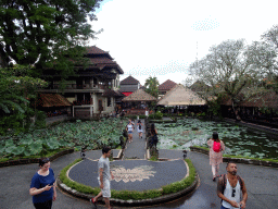 Pond with lotus plants and the Café Lotus, viewed from the front of the Pura Taman Saraswati temple