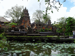 The pond with lotus plants and the front of the Pura Taman Saraswati temple, viewed from Café Lotus