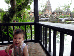 Max at the terrace of Café Lotus, with a view on the pond with lotus plants and the front of the Pura Taman Saraswati temple