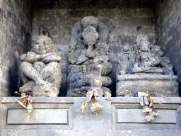 Ganesha and other statues at the Hariti Pavilion at the Goa Gajah temple