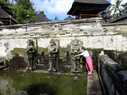 Miaomiao at the fountains at the bathing place at the Goa Gajah temple